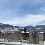 Photo showing the Now Colorado condominiums with Lake Dillon in the background.